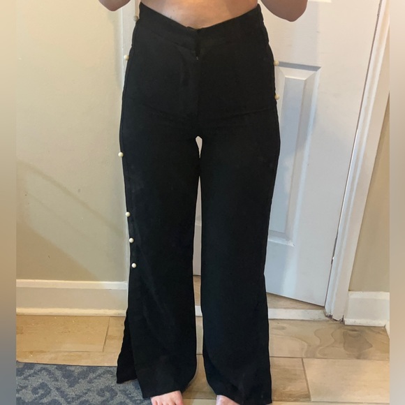 Asymmetrical pearl black flare pants - Picture 4 of 5